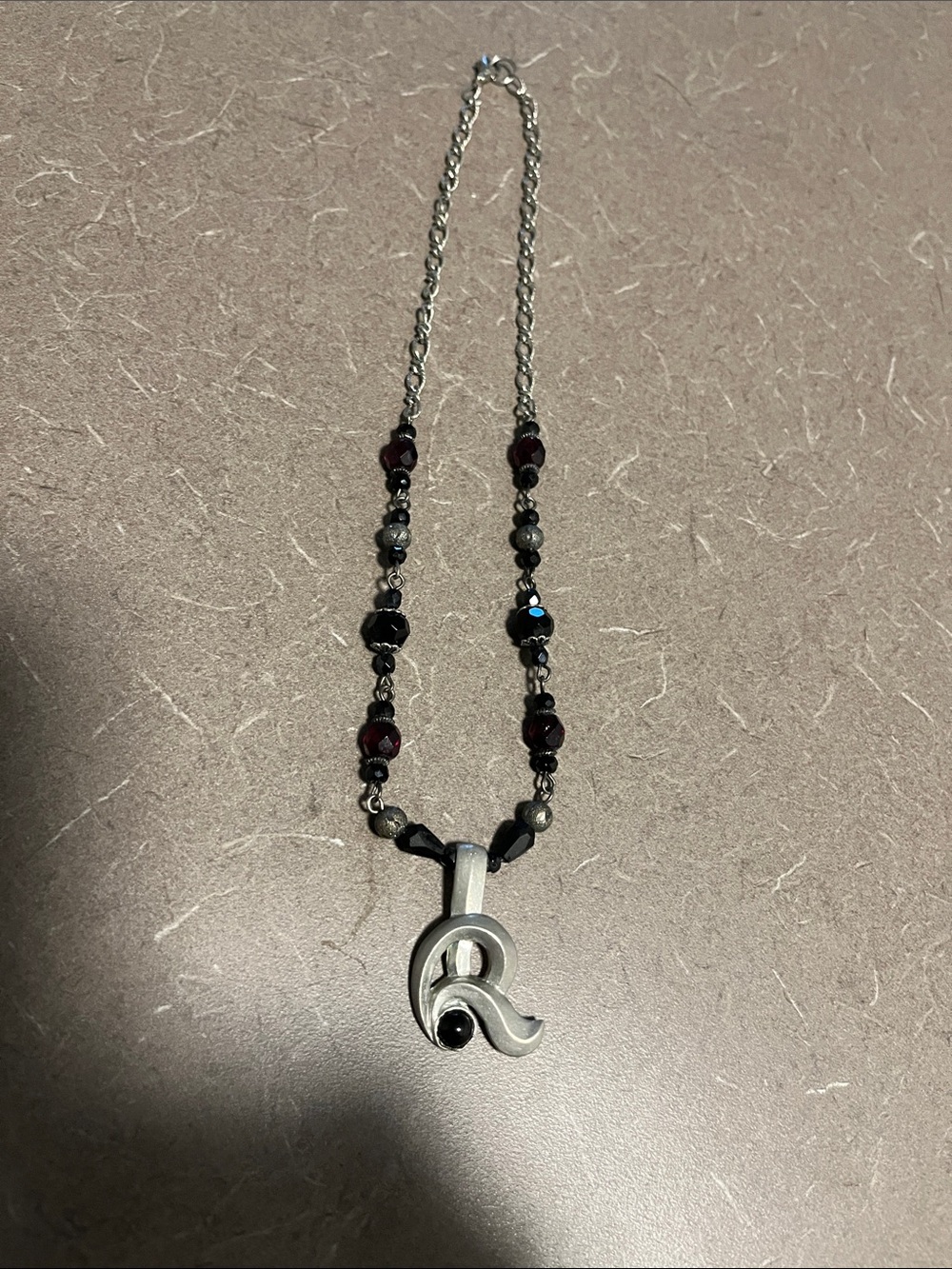 Silver tone “R” Initial Pendant Necklace with Dark Red Bead Accents
